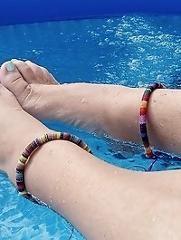 Mature woman with pierced genitalia in a seductive image collection